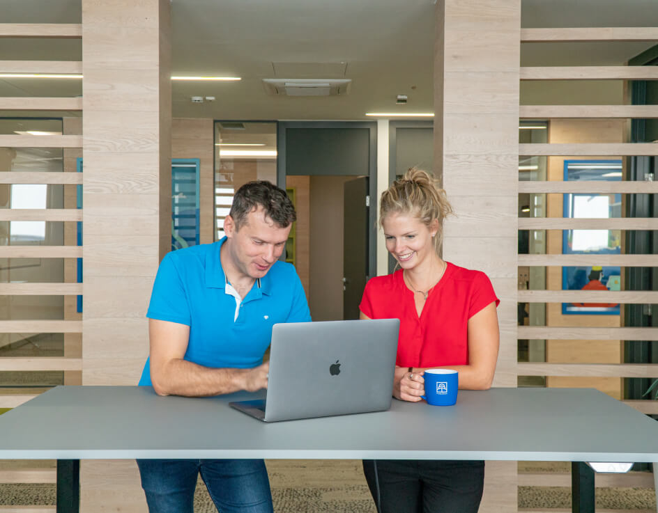 ProductDock team members smiling and talking