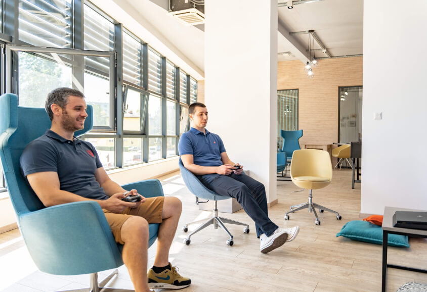 men playing video games at the office
