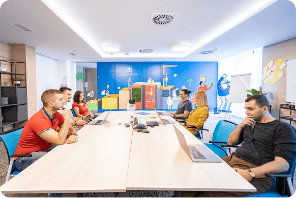 six members of ProductDock team, sitting down and talking